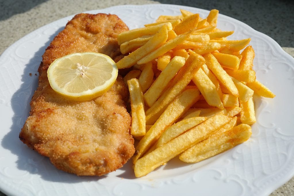 Schnitzel with lemon and fries: A classic German dish